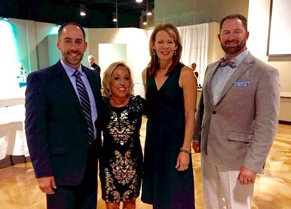 Christopher Slater and Joseph Kenney of 316 Strategy Group pictured with Julie Shrader of Rejuvenating Women and Julie Cornell of KETV 7. 316 remains committed to the long-term success of the organization.