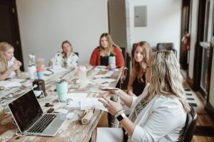 seo expert teaching omaha business around a table