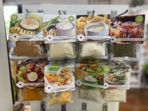 a large rack of dips and soups at a gift store in Omaha