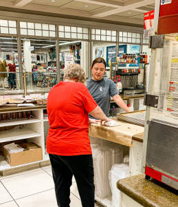 two women standing in a cookie store in omaha