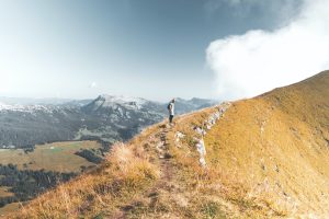 a man hiking a mountain