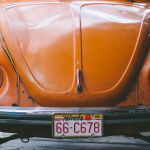 a vintage orange Volkswagen bug at holllywood candy in omaha